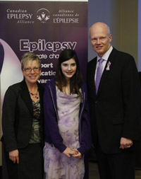 Epilepsy Ontario executive director Rozalyn Werner-Arcé, Purple Day founder Cassidy Megan and the Hon. Geoff Regan, MP, Halifax-West celebrate Purple Day for Epilepsy on Parliament Hill. This year, Purple Day was observed for the first time across the country as the official day for epilepsy awareness, since the Purple Day Act passed with unanimous support in June 2012.