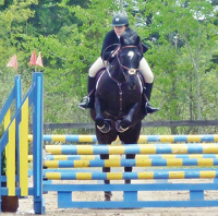 Lia Turner is seen here riding her horse, Echo.