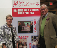 Epilepsy Ontario executive director Rozalyn Werner-Arcé and Joe Stanislaw, father of On the Edge writer-director Louis Stanislaw, are seen here after a the documentary's Canadian premiere.