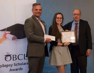 Emily Greer is pictured here receiving her $1,500 Osler Epilepsy Scholarship with Epilepsy Ontario executive director Paul Raymond (left) and Osler Business Consulting Ltd. president Lawton Osler (right) during a presentation in Toronto June 1.