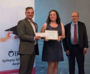 Emily Hoover is pictured here receiving her $1,500 Osler Epilepsy Scholarship with Epilepsy Ontario executive director Paul Raymond (left) and Osler Business Consulting Ltd. president Lawton Osler (right) during a presentation in Toronto June 1.