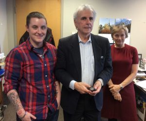 Adam Prashaw, far left, is seen here with neurosurgeon Dr. Andre Olivier and his assistant Monica Malecka.